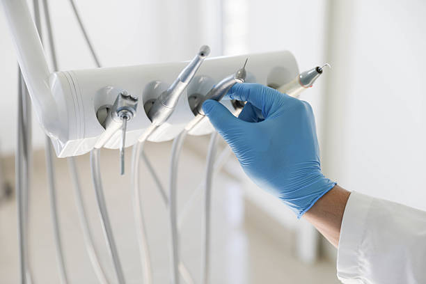 Professional Emergency Dentist technician working in Tamiami, FL